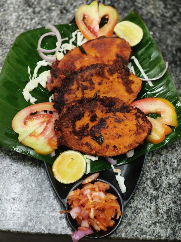 Signature plant protein dish served on a banana leaf at Evergreen County, a premier pure veg and adventure resort.