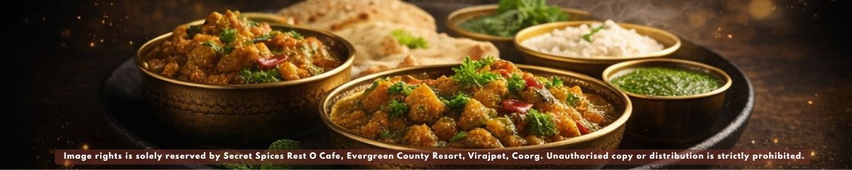 A premium 100% vegetarian meal spread at Secret Spices Rest O Cafe, Evergreen County Resort, Virajpet, Coorg, India's first adventure and veg resort.
